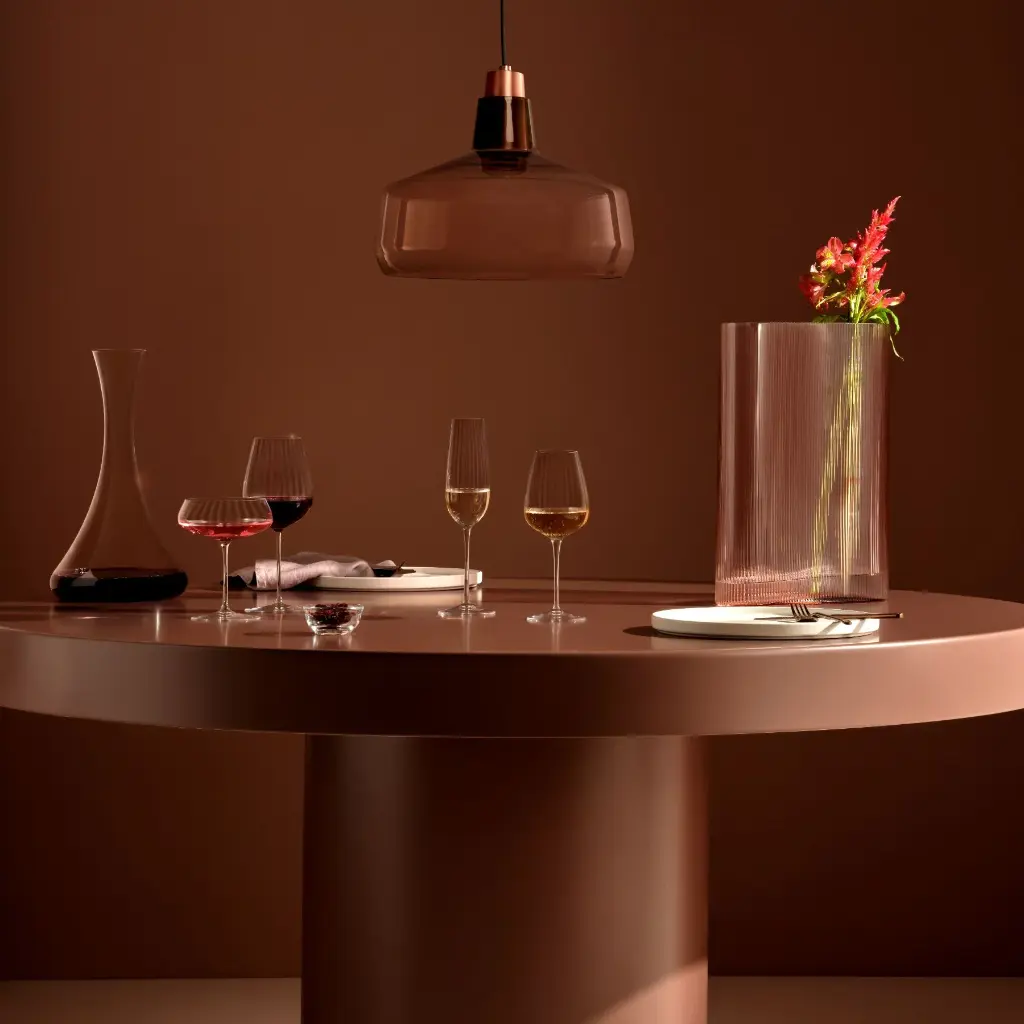Jazzdecanter_Roundupcollectionglasses_Mistvasetalldustyrose_Monopendantwide.webp